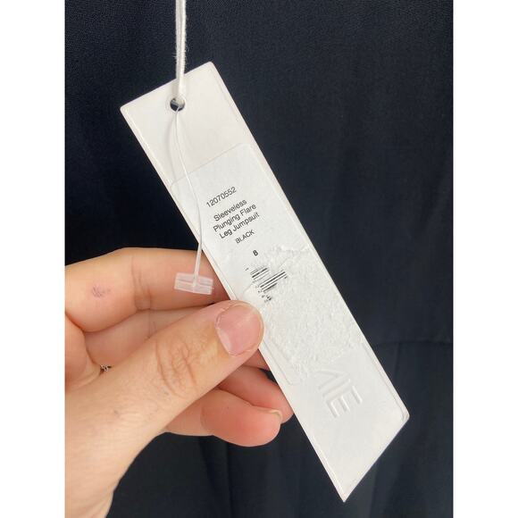 Cushnie Solid Black Sleeveless Plunging Split Flare Leg Jumpsuit Size 8 NWT - Picture 7 of 8